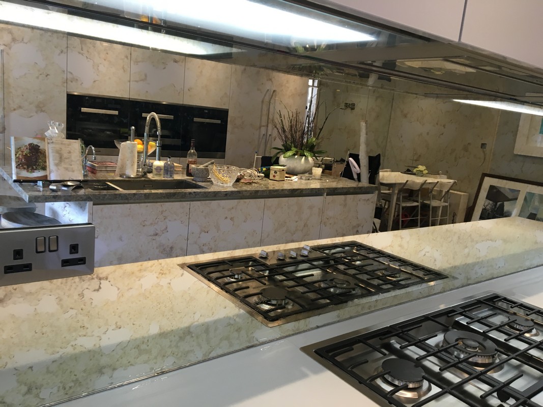 Mirror glass splashback in Kilburn luxury kitchen